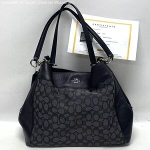 COACH ! Black Signature Pattern Canvas and Leather Multi compartment handbag